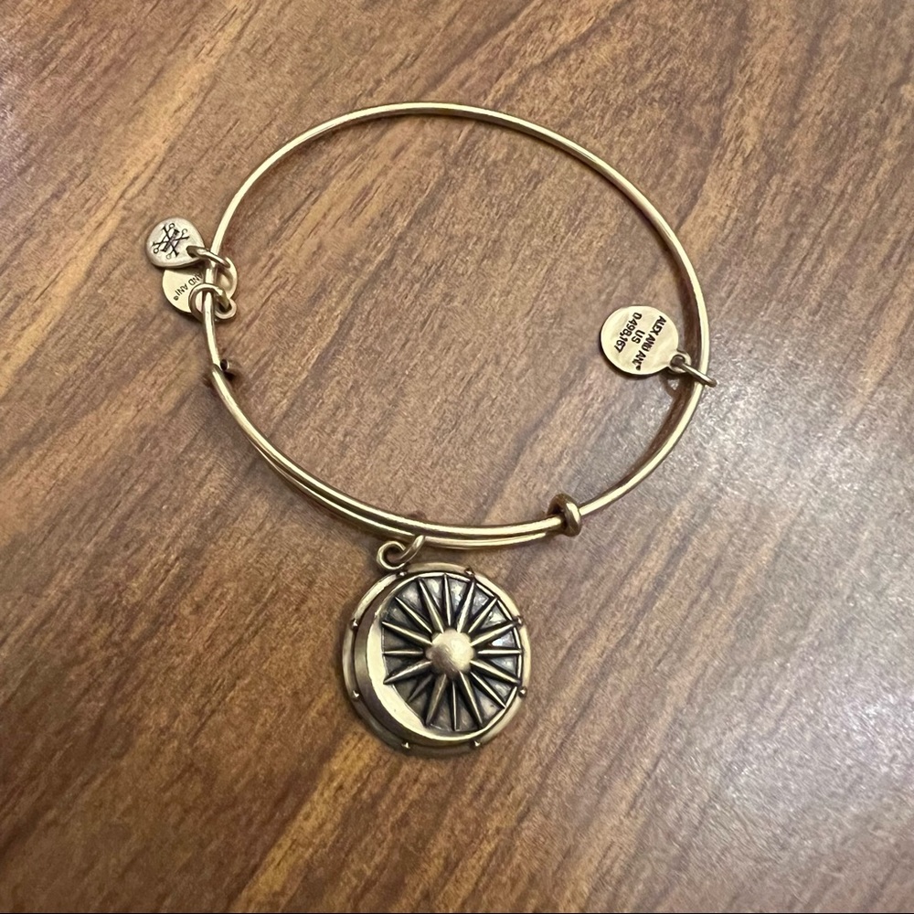 Alex and Ani gold bangle - cosmic balance charm